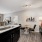 Kitchen with granite countertops and brown cabinets